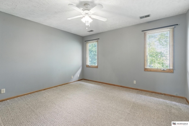 10428 Monroe St, Omaha, NE 68127 - carpeted empty room featuring baseboards and ceiling fan