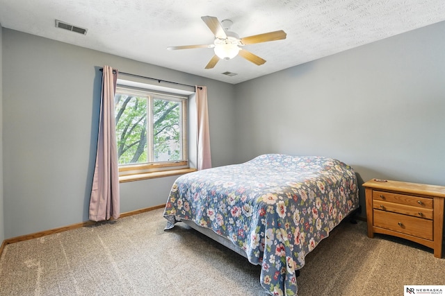 10428 Monroe St, Omaha, NE 68127 - carpeted bedroom with baseboards and a ceiling fan