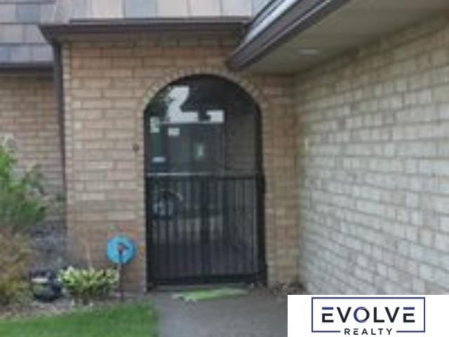 1599 S Main St Unit 7, Fremont, NE 68025 - property entrance with brick siding