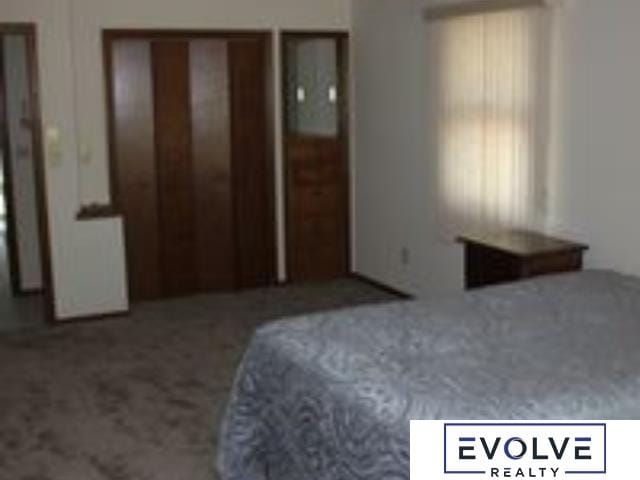 1599 S Main St Unit 7, Fremont, NE 68025 - view of carpeted bedroom