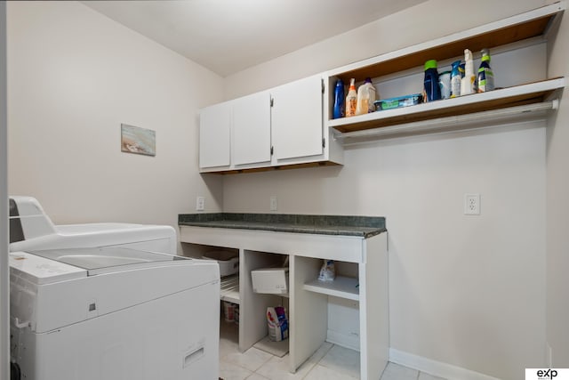 6772 Hamilton St, Omaha, NE 68132 - washroom with separate washer and dryer, cabinet space, and light tile patterned flooring