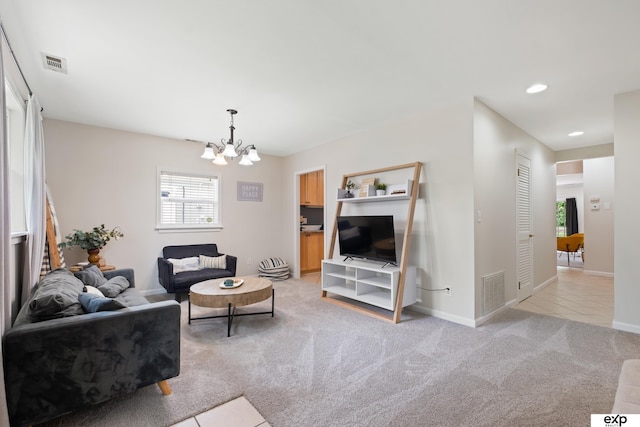 6772 Hamilton St, Omaha, NE 68132 - living area with a chandelier, baseboards, recessed lighting, light colored carpet, and light tile patterned flooring