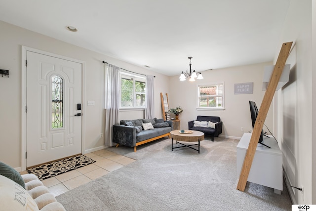 6772 Hamilton St, Omaha, NE 68132 - carpeted living room featuring healthy amount of natural light, a chandelier, tile patterned flooring, and baseboards