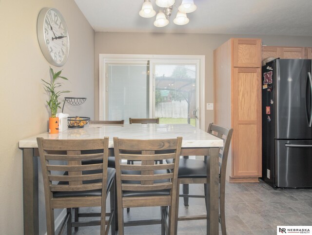 1715 Belford St, Lincoln, NE 68521 - dining room featuring a chandelier