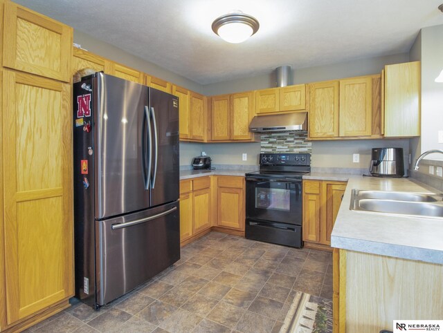 1715 Belford St, Lincoln, NE 68521 - kitchen featuring freestanding refrigerator, black electric range, ventilation hood, a sink, and light countertops