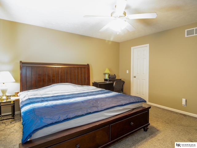1715 Belford St, Lincoln, NE 68521 - carpeted bedroom with baseboards and a ceiling fan