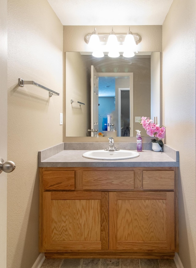 1715 Belford St, Lincoln, NE 68521 - bathroom featuring vanity and tile patterned flooring