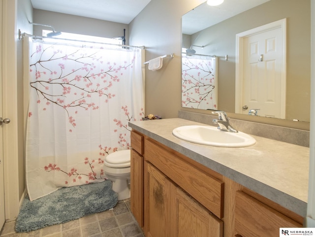 1715 Belford St, Lincoln, NE 68521 - full bath featuring vanity, toilet, and curtained shower