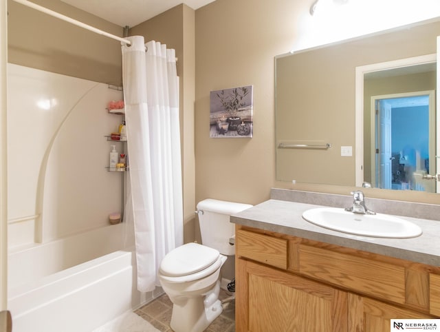 1715 Belford St, Lincoln, NE 68521 - bathroom with vanity, shower / tub combo, and toilet