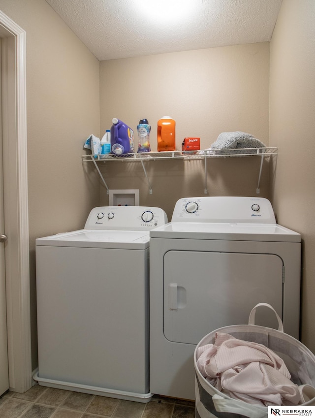 1715 Belford St, Lincoln, NE 68521 - laundry area with separate washer and dryer and a textured ceiling