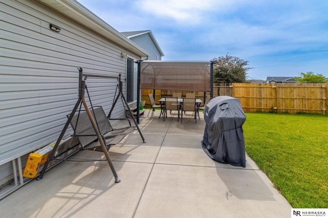 1715 Belford St, Lincoln, NE 68521 - view of patio featuring outdoor dining space and area for grilling
