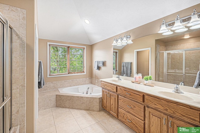 2231 Crystal Creek Dr, Papillion, NE 68046 - bathroom featuring tile patterned flooring, a garden tub, double vanity, a stall shower, and lofted ceiling