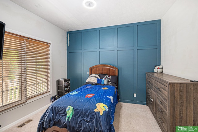 2231 Crystal Creek Dr, Papillion, NE 68046 - bedroom featuring carpet, a decorative wall, and baseboards