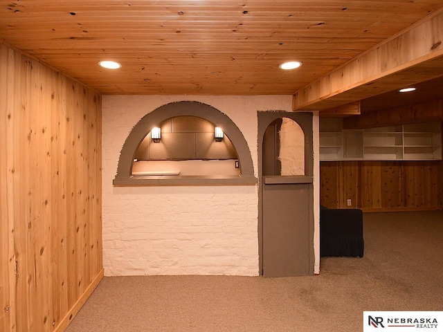 4540 S 41st St, Omaha, NE 68107 - hallway with carpet floors, wood ceiling, wood walls, and recessed lighting