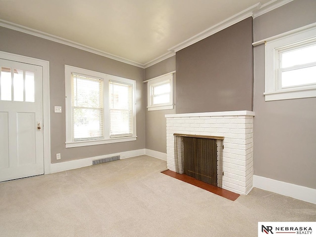 4540 S 41st St, Omaha, NE 68107 - unfurnished living room with carpet flooring, crown molding, baseboards, and a fireplace