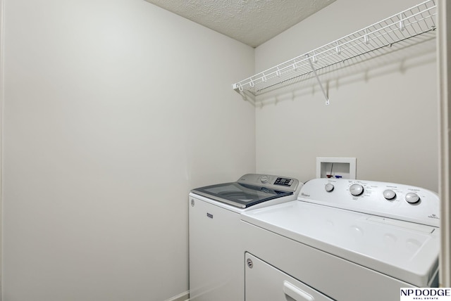 15930 Grebe St, Bennington, NE 68007 - laundry area featuring washer and dryer