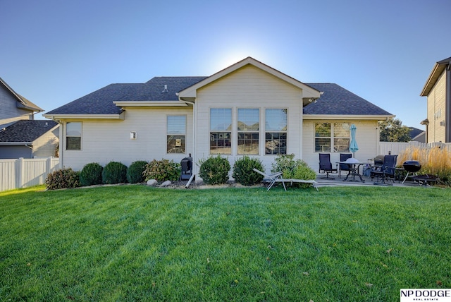 15930 Grebe St, Bennington, NE 68007 - rear view of house featuring a patio area and a shingled roof