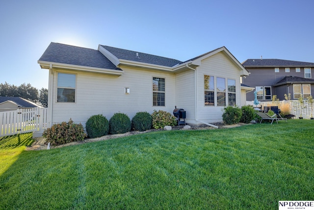 15930 Grebe St, Bennington, NE 68007 - rear view of house featuring roof with shingles