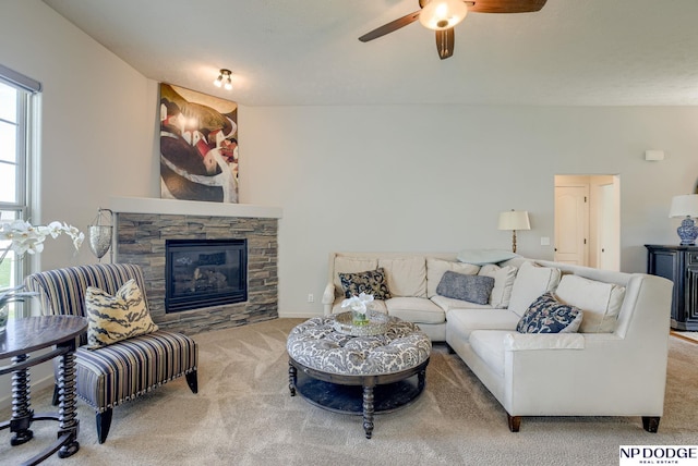 15930 Grebe St, Bennington, NE 68007 - carpeted living area featuring ceiling fan and a stone fireplace