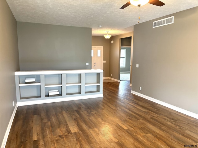 221 Briarwood Ln, Seward, NE 68434 - unfurnished room with ceiling fan, wood finished floors, baseboards, and a textured ceiling