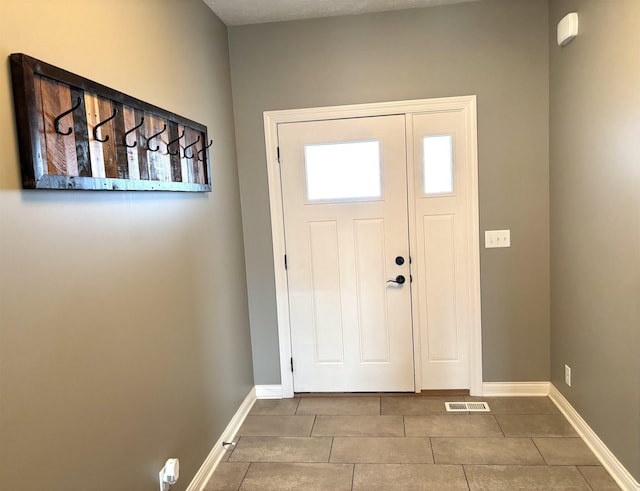 221 Briarwood Ln, Seward, NE 68434 - foyer featuring baseboards and tile patterned floors