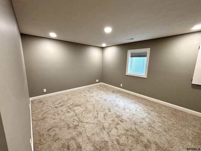 221 Briarwood Ln, Seward, NE 68434 - spare room featuring carpet, recessed lighting, and baseboards