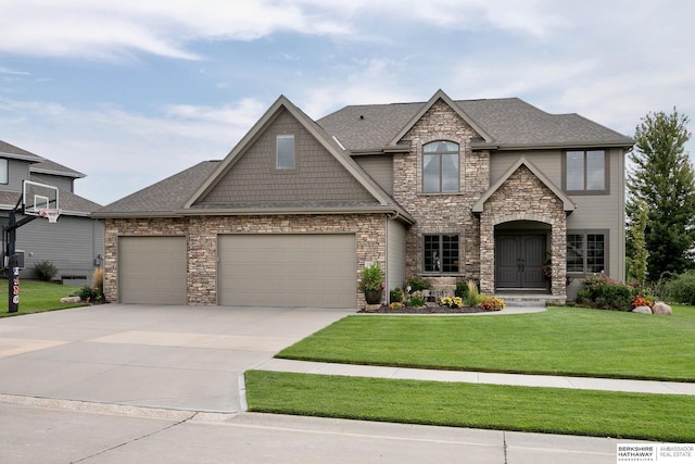 1809 S 220th Ave, Omaha, NE 68022 - view of front of house with stone siding, driveway, a front lawn, and a garage