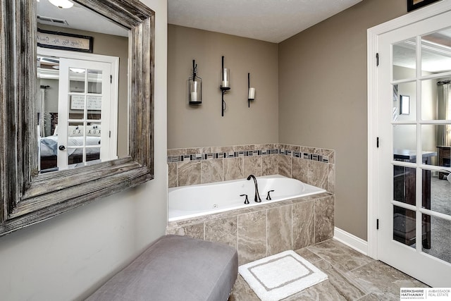 1809 S 220th Ave, Omaha, NE 68022 - full bath with a jetted tub and marble look tile flooring