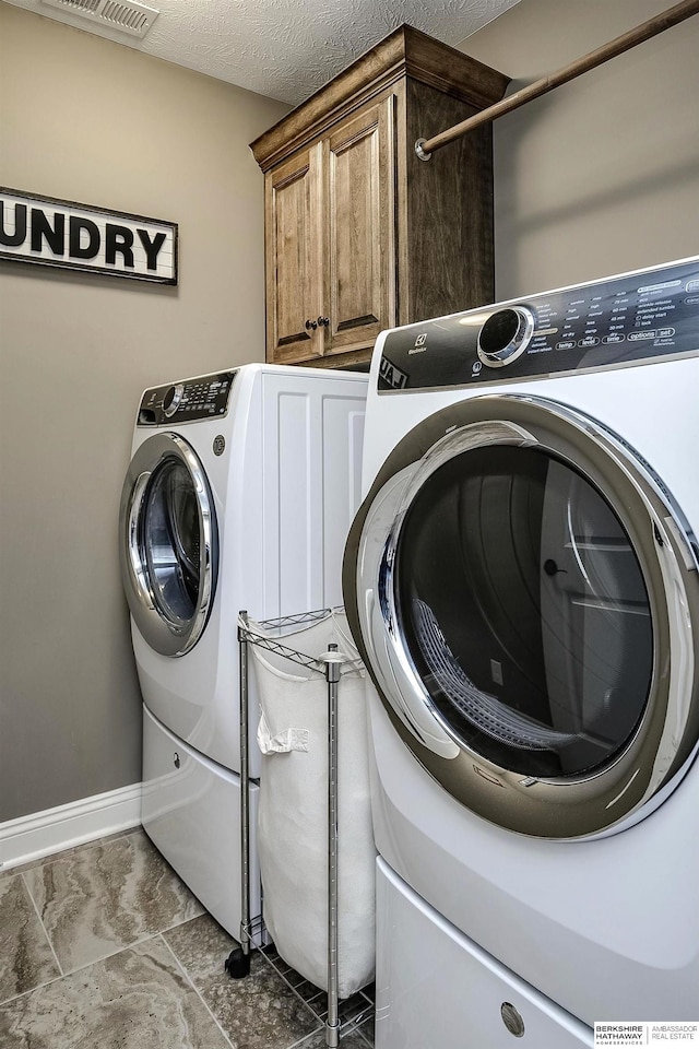 1809 S 220th Ave, Omaha, NE 68022 - laundry area with cabinet space and independent washer and dryer
