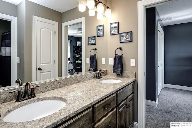 1809 S 220th Ave, Omaha, NE 68022 - bathroom with double vanity and baseboards