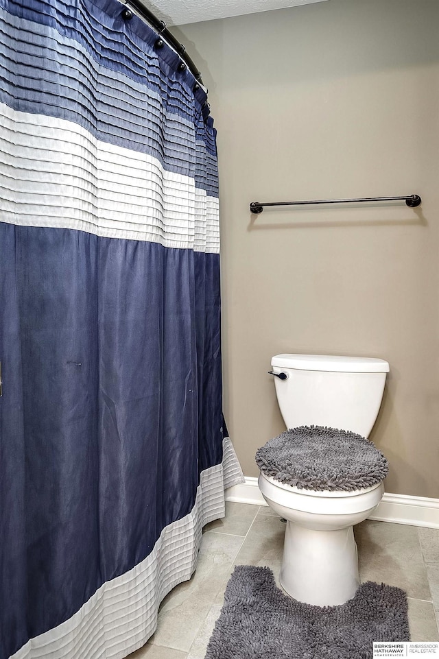 1809 S 220th Ave, Omaha, NE 68022 - full bath with tile patterned floors and a shower with shower curtain