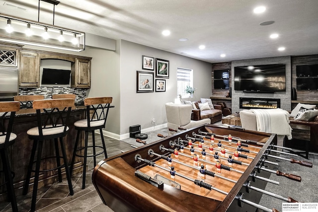 1809 S 220th Ave, Omaha, NE 68022 - game room featuring recessed lighting and a fireplace