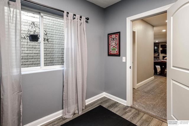 1809 S 220th Ave, Omaha, NE 68022 - doorway to outside with wood finished floors and recessed lighting