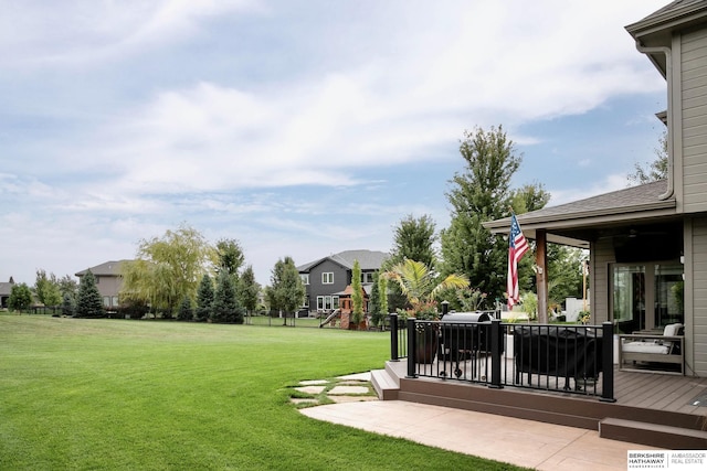 1809 S 220th Ave, Omaha, NE 68022 - view of grassy yard featuring a playground and a deck