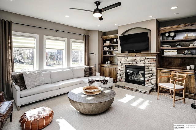 1809 S 220th Ave, Omaha, NE 68022 - living area with plenty of natural light, ceiling fan, a fireplace, carpet floors, and recessed lighting