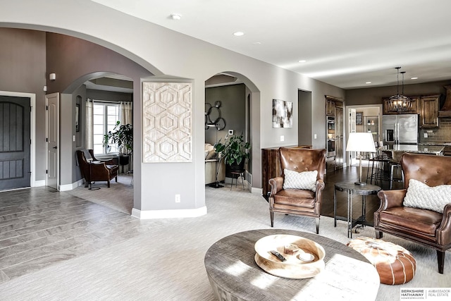 1809 S 220th Ave, Omaha, NE 68022 - living room with arched walkways and recessed lighting