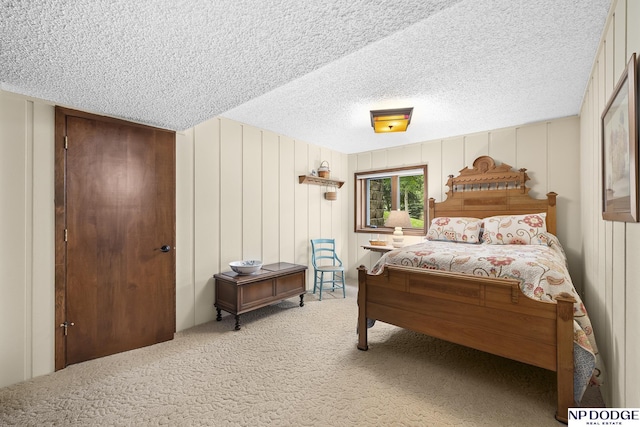 2723 Eagle Dr, Fremont, NE 68028 - bedroom featuring light carpet and a textured ceiling