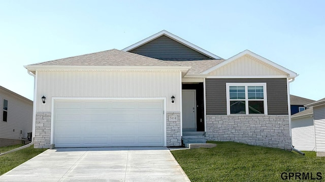 7232 S 204th Ave, Gretna, NE 68028 - ranch-style home featuring driveway, roof with shingles, stone siding, a garage, and a front yard