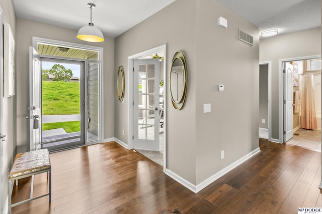15301 Kansas Ave, Omaha, NE 68116 - entrance foyer featuring hardwood / wood-style floors, healthy amount of natural light, and baseboards