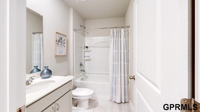 8520 S 179th St, Omaha, NE 68137 - bathroom with vanity, toilet, and shower / tub combo with curtain