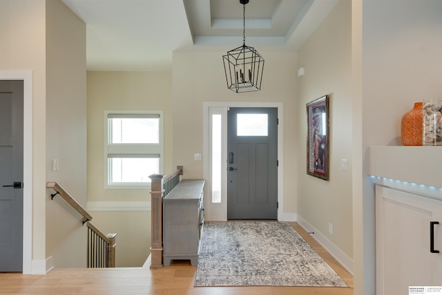11511 S 190th St, Gretna, NE 68028 - entrance foyer with light wood-type flooring, plenty of natural light, a chandelier, and baseboards