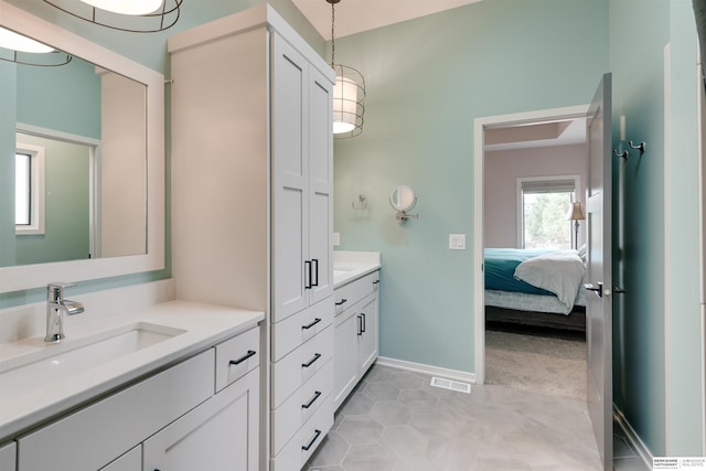 11511 S 190th St, Gretna, NE 68028 - full bath with vanity, connected bathroom, baseboards, and tile patterned floors