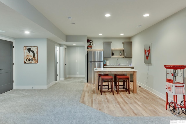 11511 S 190th St, Gretna, NE 68028 - kitchen featuring freestanding refrigerator, gray cabinets, recessed lighting, light countertops, and baseboards