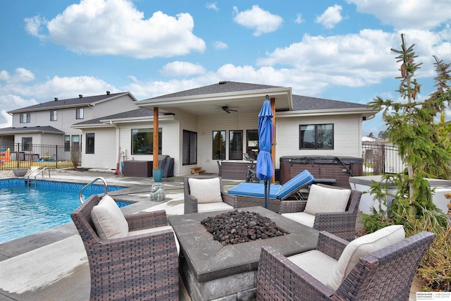 11511 S 190th St, Gretna, NE 68028 - rear view of property with a hot tub, a ceiling fan, a patio area, a fenced backyard, and an outdoor living space with a fire pit