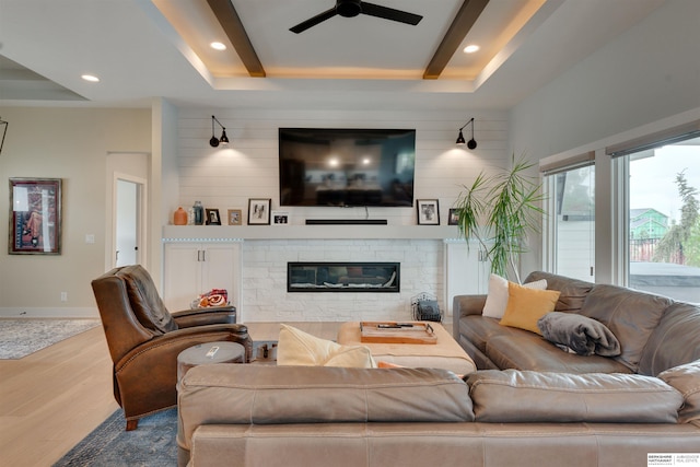 11511 S 190th St, Gretna, NE 68028 - living room with wood finished floors, a fireplace, ceiling fan, recessed lighting, and wood walls