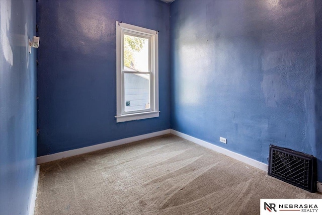 610 S 10th St, Plattsmouth, NE 68048 - spare room featuring carpet floors and baseboards