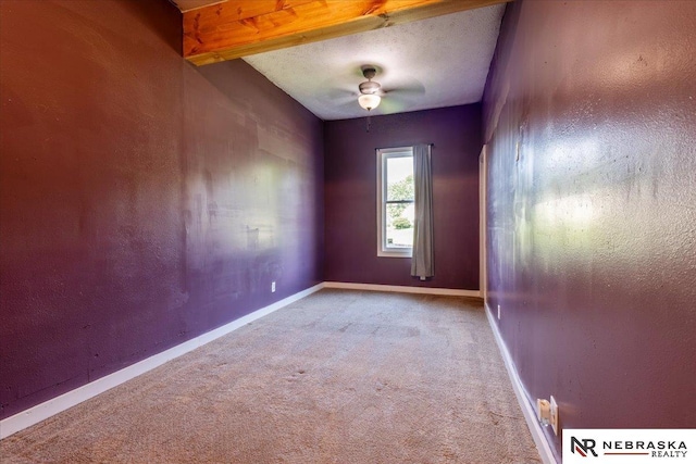 610 S 10th St, Plattsmouth, NE 68048 - carpeted empty room featuring a ceiling fan and baseboards