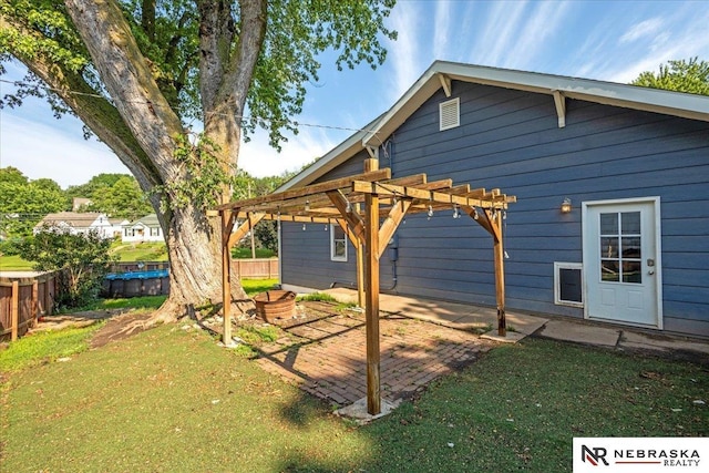 610 S 10th St, Plattsmouth, NE 68048 - view of yard with a pergola and a patio area