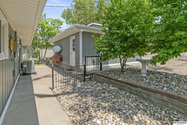 S-44 Poehling Ln, Fremont, NE 68025 - view of patio featuring central air condition unit