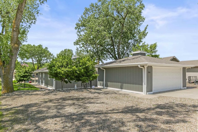 S-44 Poehling Ln, Fremont, NE 68025 - view of front of house with an attached garage and concrete driveway